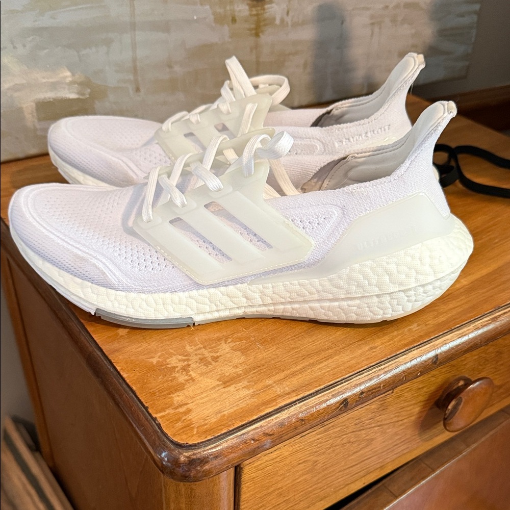 adidas White Tennis (hard court) shoe.